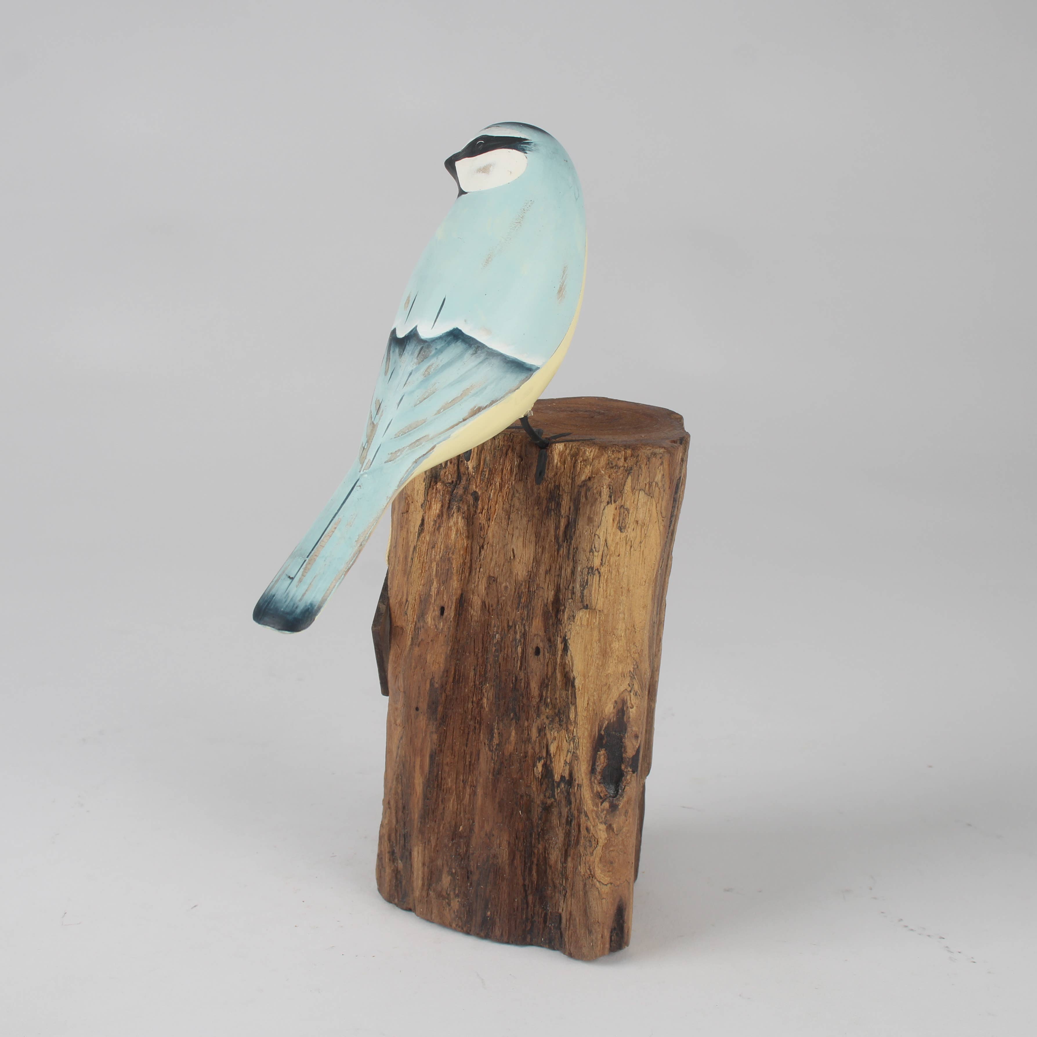 Hand Carved Blue Tit on Tree Stump by Archipelago