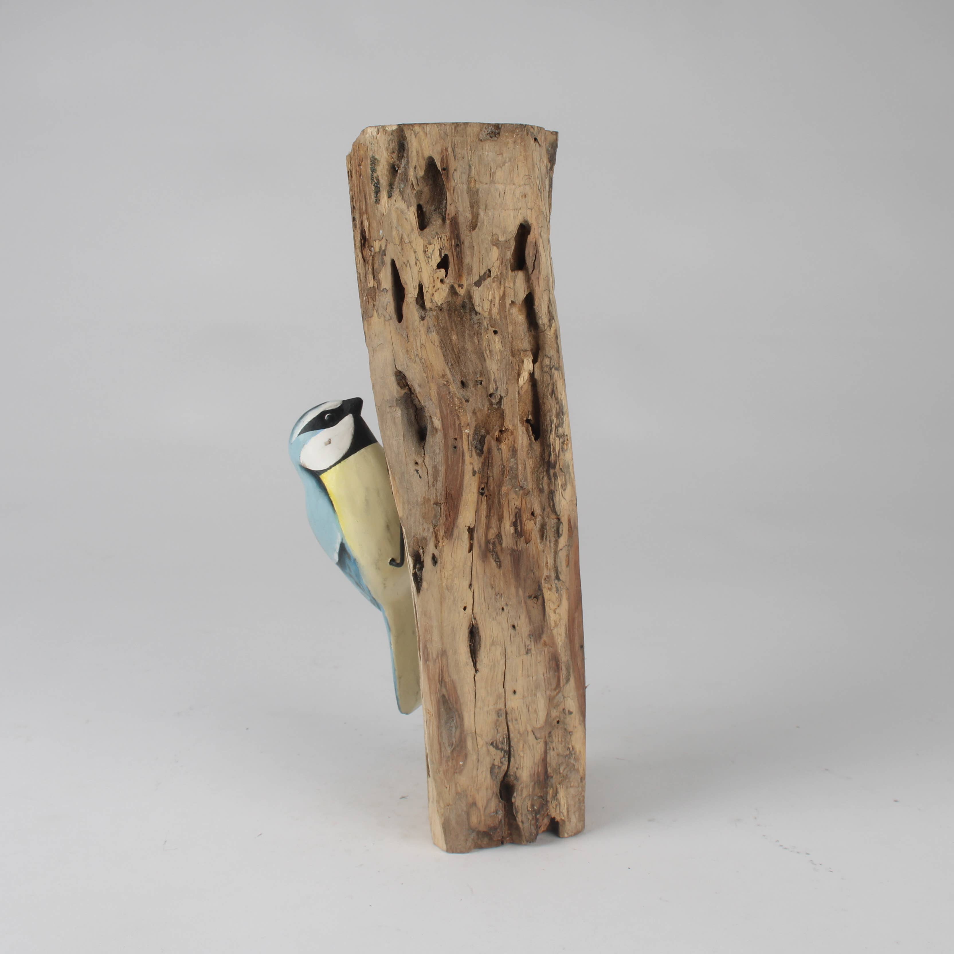 Hand Carved Blue Tit Family on Tree Stump by Archipelago