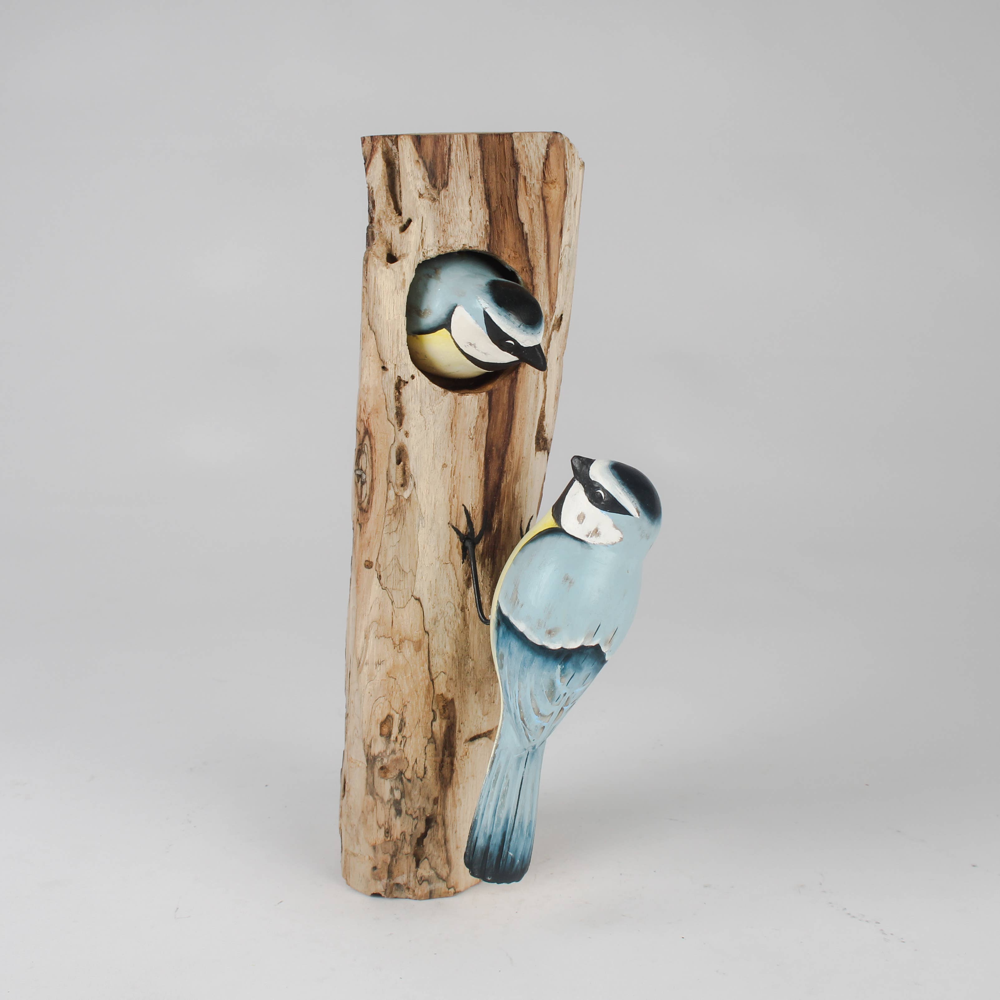 Hand Carved Blue Tit Family on Tree Stump by Archipelago